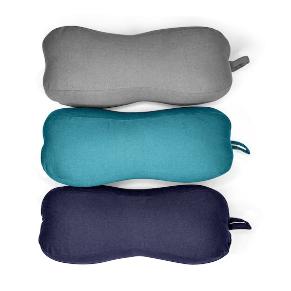 grey, navy and aqua peanut pillows next to each other to showcase colours