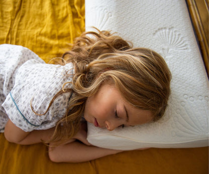 child sleeping on kids memory foam pillow