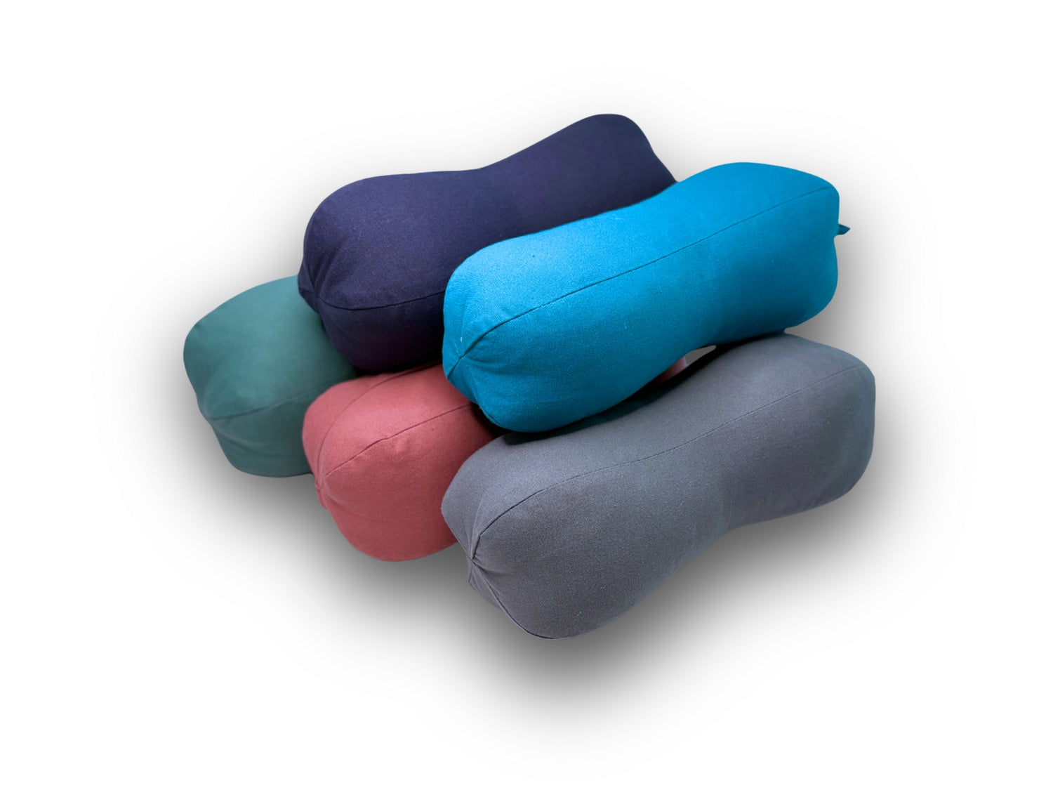 Peanut Pillows in 5 colours stacked on top of each other