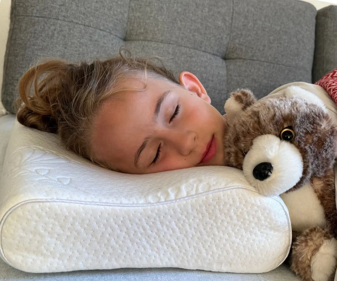 Young girl side sleeping on the ergonomic Posture Form kids pillow