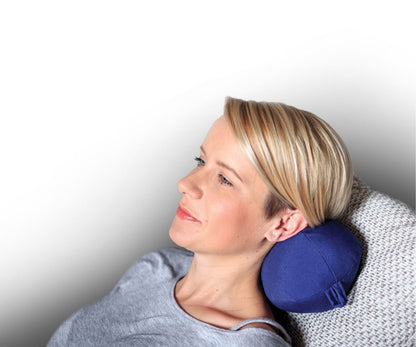 woman with neck support pillow