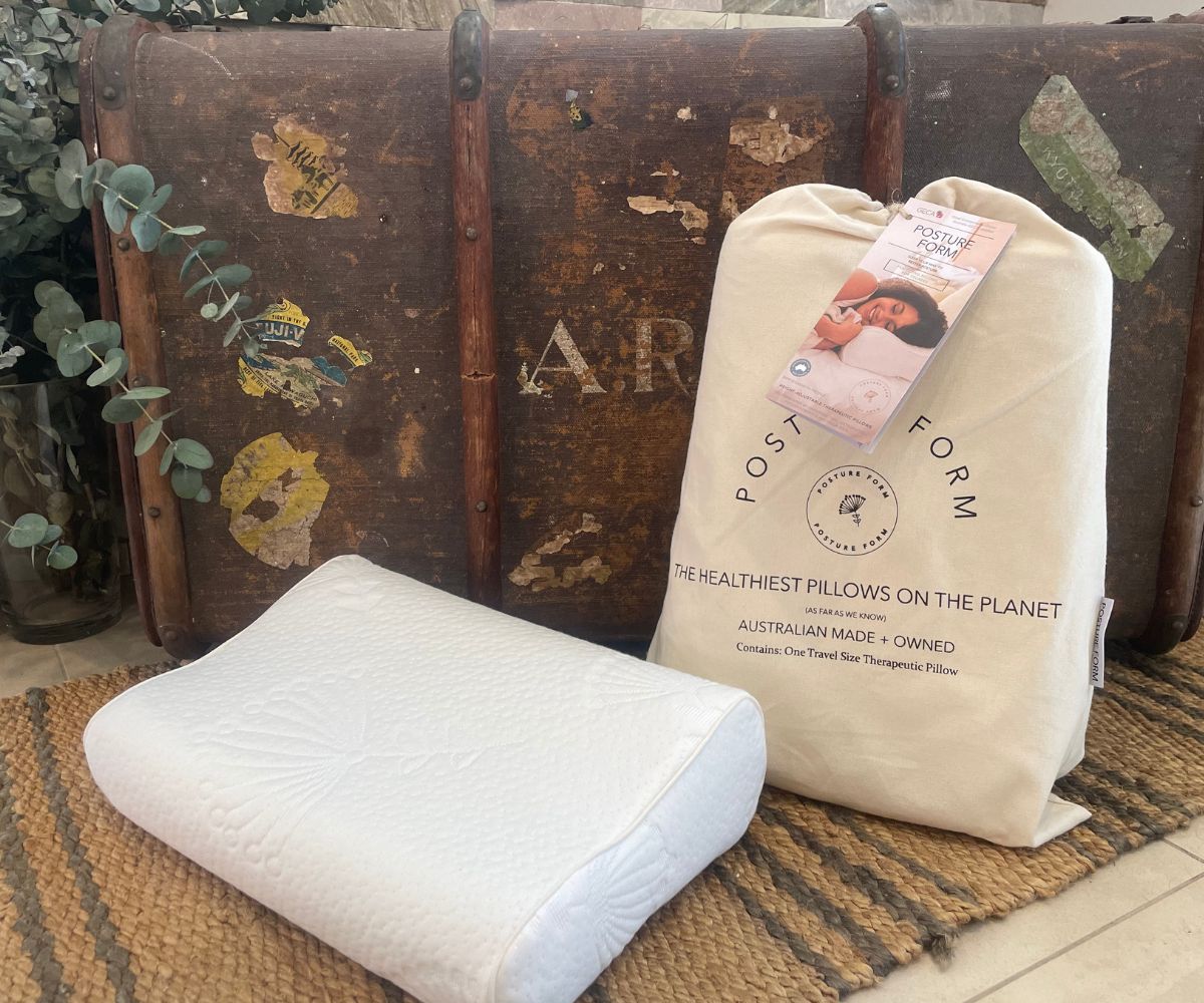 Travel pillow providing side sleeper neck support while away from home